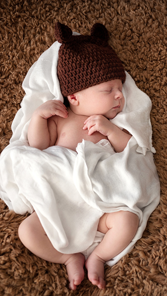 https://s1.1zoom.ru/b3349/947/Infants_Winter_hat_Sleep_543718_540x960.jpg