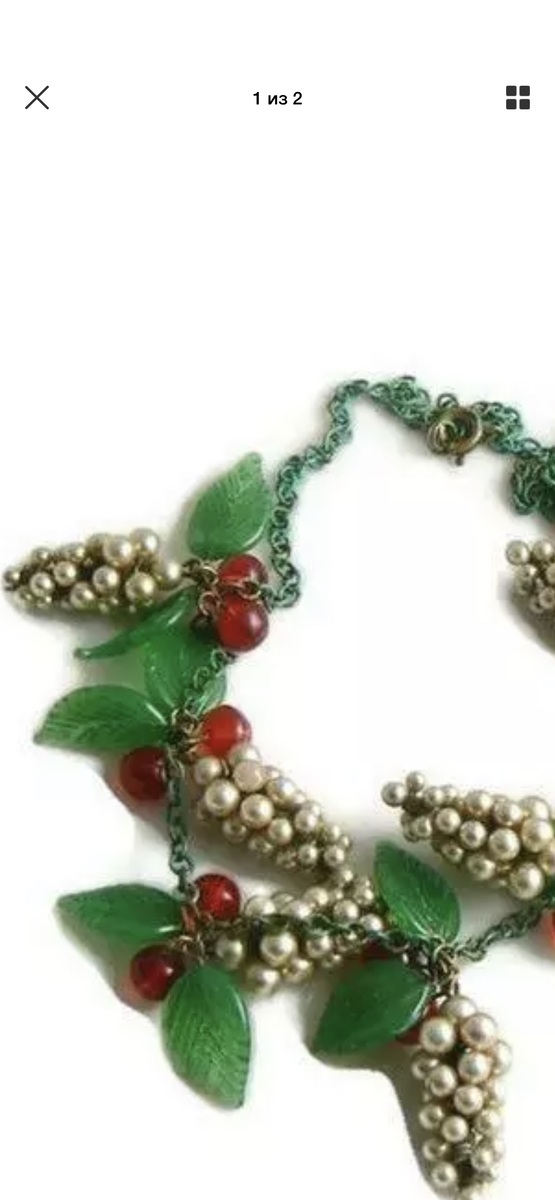 Застежка хоть и характерна для Ар деко, но не Haskell 