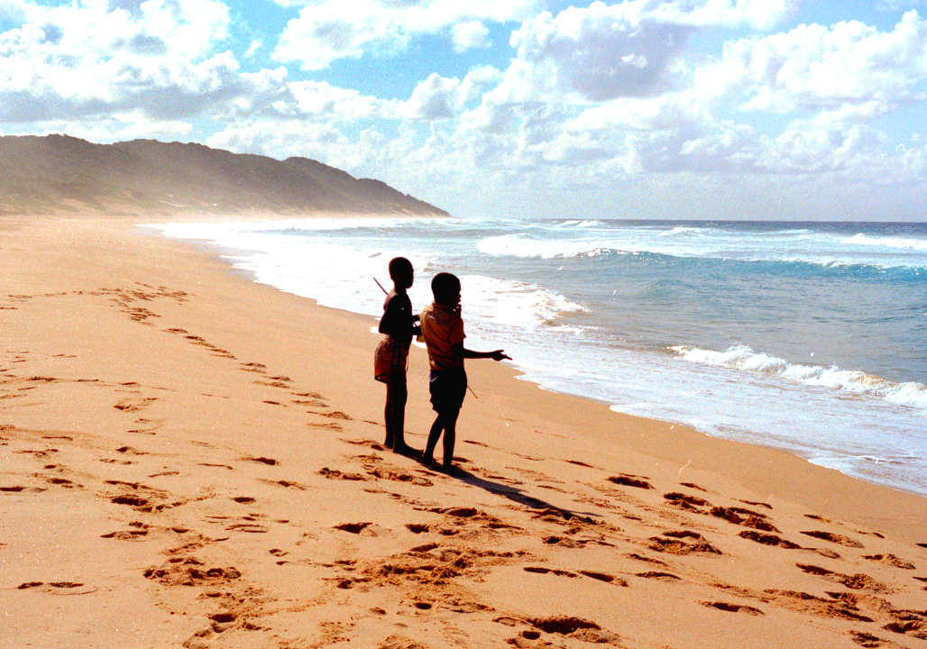 Near shoring. Woman boy Beach.