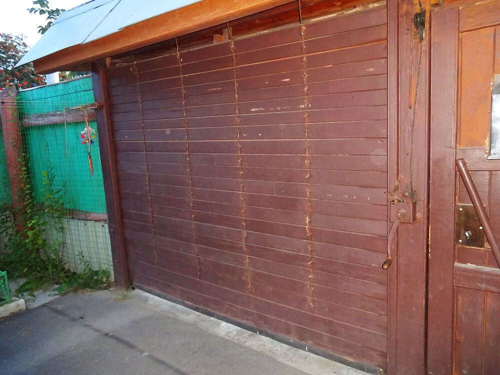 Поднимаем гаражные ворота: сложные проблемы и простые решения - Все про ворота