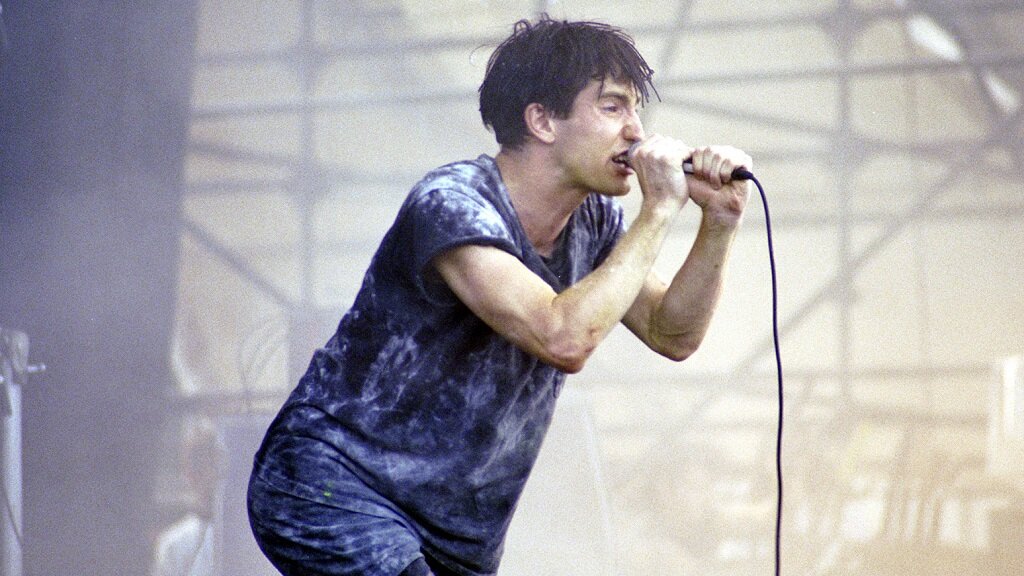 Трент Резнор во время выступления на фестивале Lollapalooza, 1991 год.