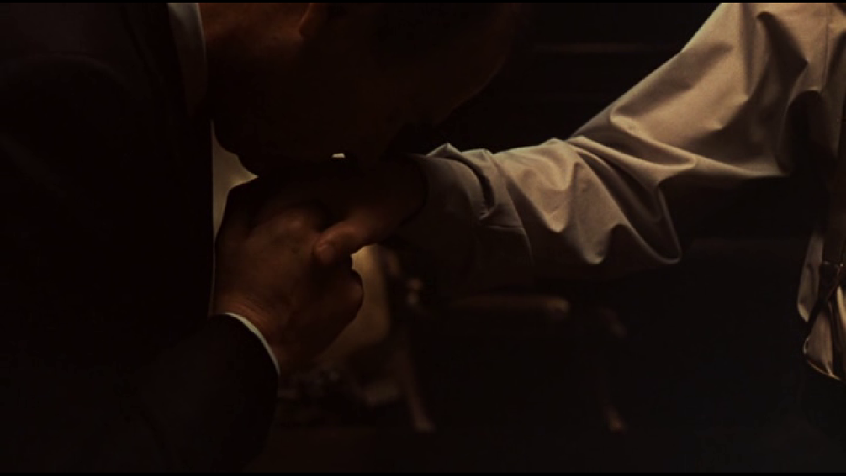 Кадр из фильма "Крестный отец 2"(1974) и картина Караваджо "Мальчик с корзиной фруктов"