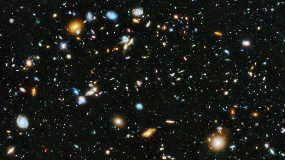 Фото Вселенной в исполнении телескопа Хаббл, 2014 год. Фото:  NASA, ESA, H. Teplitz and M. Rafelski (IPAC/Caltech), A. Koekemoer (STScI), R. Windhorst (Arizona State University), and Z. Levay (STScI)