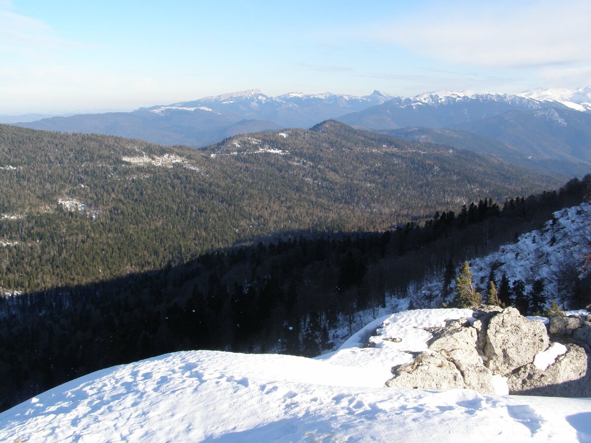 Где-то там за горами, и, говорят, сравнительно недалеко расположена Красная Поляна, а за ней Сочи. Ну и Грузия недалеко.  