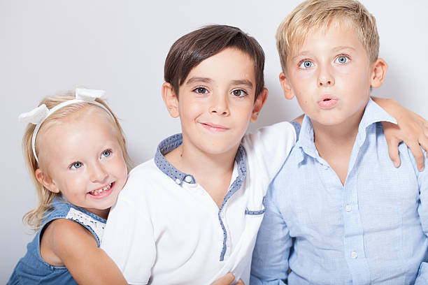 https://media.gettyimages.com/photos/portrait-of-three-child-friends-two-boys-and-one-girl-picture-id485413956?b=1&k=6&m=485413956&s=612x612&w=0&h=tIMOO5iLY9IV0XS_he449bQQJrY7r6-LuzgGHDwyfFo=