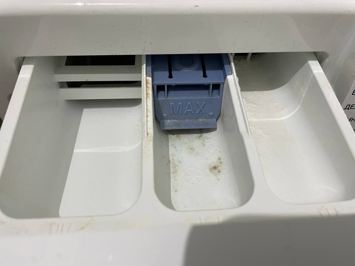 Отсек для стирального порошка в машинке