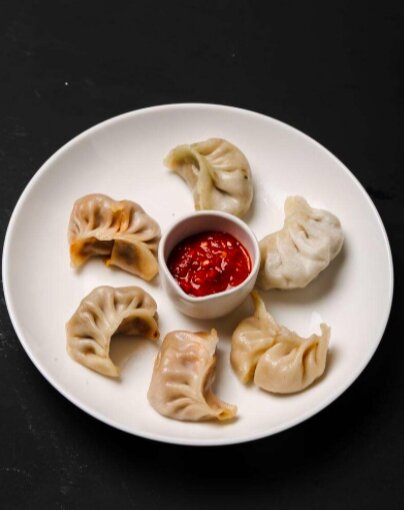 Свежеприготовленные момо (Фото: zomato.com)