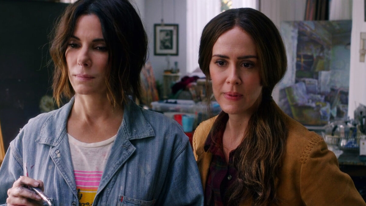 Кадр из фильма (Мэлори и Джессика обсуждают нарисованную картину)