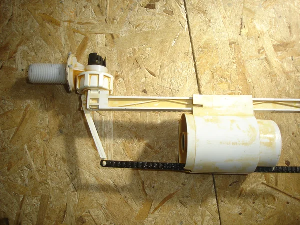 Поплавковая и запорная система для бочка унитаза.