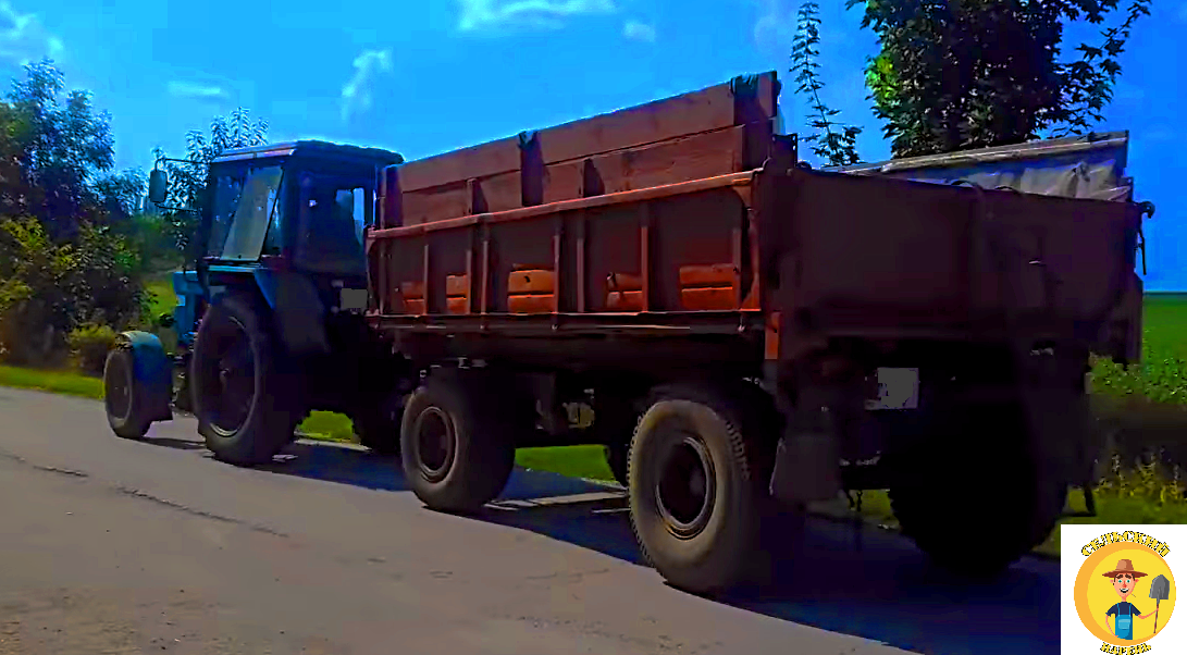 Трактор МТЗ-82 с телегой 2птс4