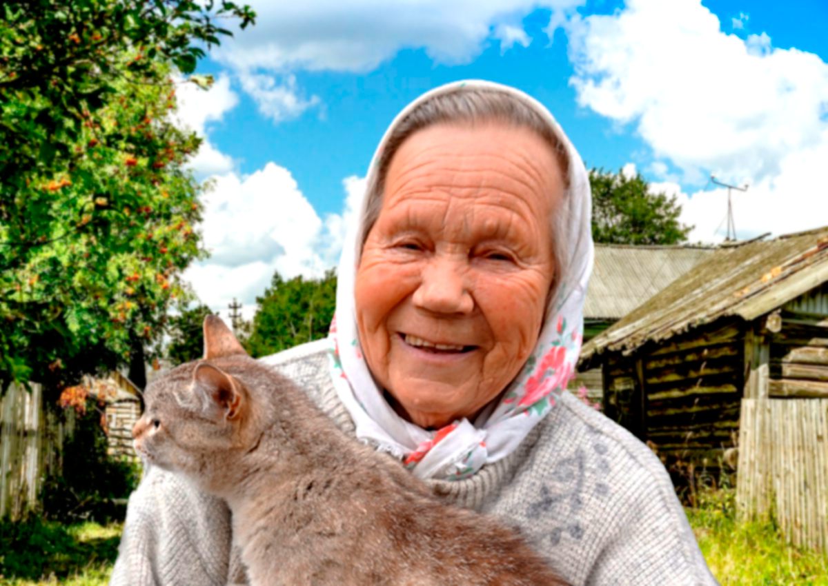 Бабушка в деревне с кошкой.