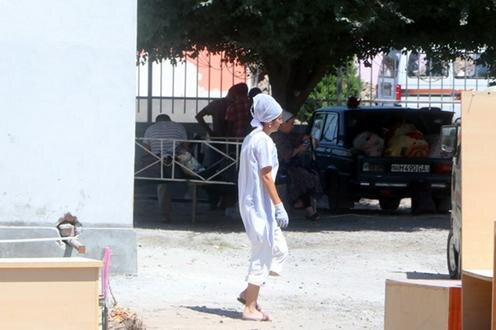  Учителя на работах в Чусте. Фото с сайта Kun.uz