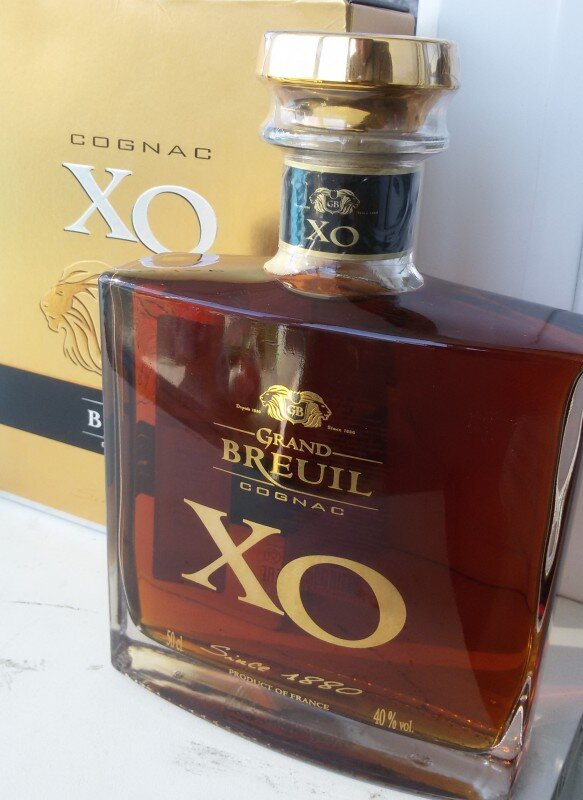 Cognac xo цена. Cognac Grand Breuil XO. Коньяк французский Breuil. Коньяк Шустов x.o. Французский коньяк Иксо.