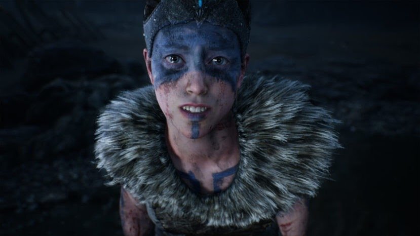 В центре "Hellblade" - история кельтской девушки Сенуа, отправившейся в скандинавский ад за душой возлюбленного.

Игра подкупает атмосферой невероятной мрачности и безумия. Неудивительно, ведь смерть любимого разрушила внутренний мир и без того душевнобольной девушки. Сенуа постоянно слышит в своей голове голоса, и чем сильнее повреждается её разум, тем чаще и назойливее становятся комментарии окружающего Сенуа легиона.

Проект впечатляет не только атмосферой и проработкой сценария - "Hellblade" подкупает мощной, почти театральной постановкой. Во время сюжетных роликов Сенуа буквально заглядывает к вам в душу, намекая, что игрок - лишь один из многочисленных голосов в её голове. Благодаря этому, погружённость в игровой процесс - запредельная. Мы по-настоящему переживаем за Сенуа, а концовка своей эмоциональностью сможет заставить рыдать навзрыд.