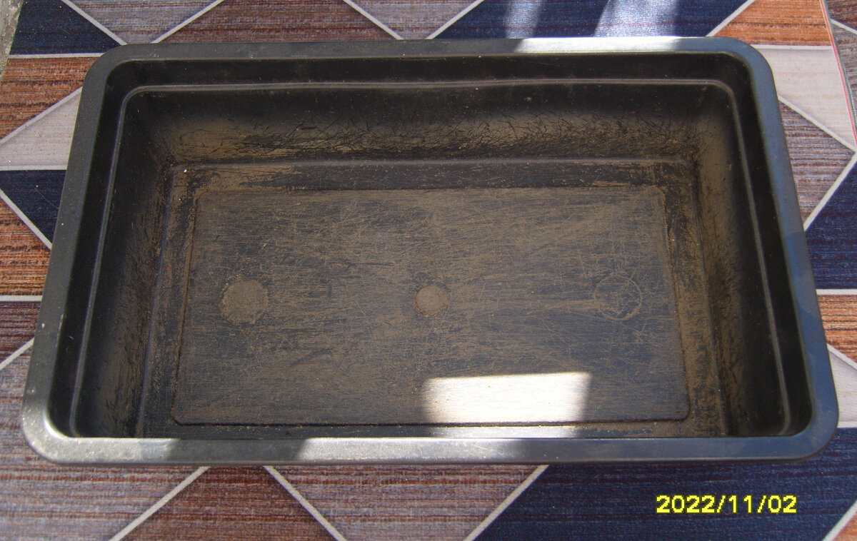 Ящик для рассады, который используется для приготовления земли