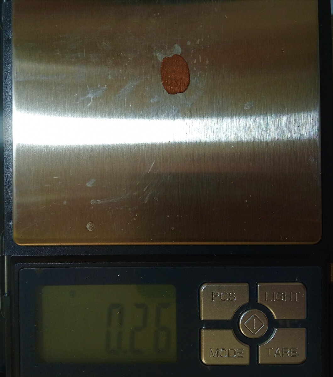 Самая маленькая денежка в моей коллекции - это чешуйка.