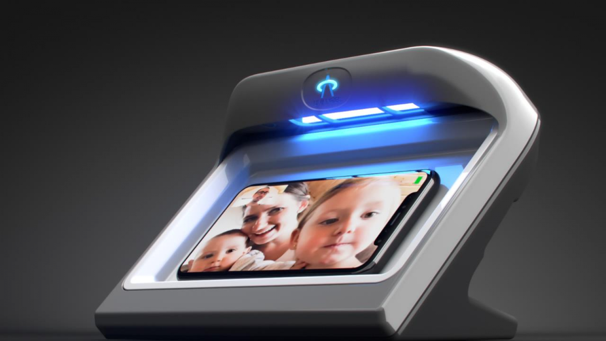 Система беспроводной зарядки смартфонов с функцией их дезинфекции 