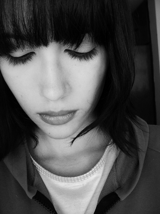 https://pixabay.com/photos/sad-woman-sorrow-sadness-young-468923/