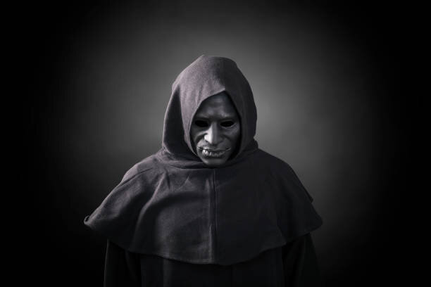 https://media.istockphoto.com/photos/scary-figure-in-hooded-cloak-with-mask-picture-id1191856513?k=6&m=1191856513&s=612x612&w=0&h=qnYLiERgMJst7FpdXGoearS2MMGe2FDAEl37iHAOoU0=