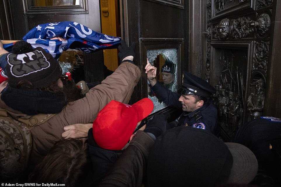 https://www.dailymail.co.uk/news/article-9121381/Capitol-Building-stormed-Trump-supporters-leaving-four-dead.html