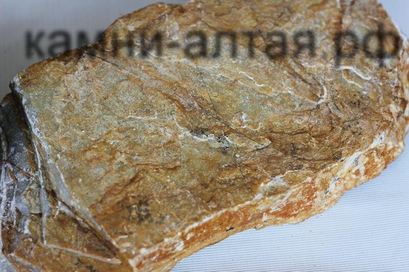 Алтайский сланец колотый в ручную "Око Саурона", подходит для облицовки цоколя и отмостки. Как в виде плитки в раскладке, так и рваными пластами.