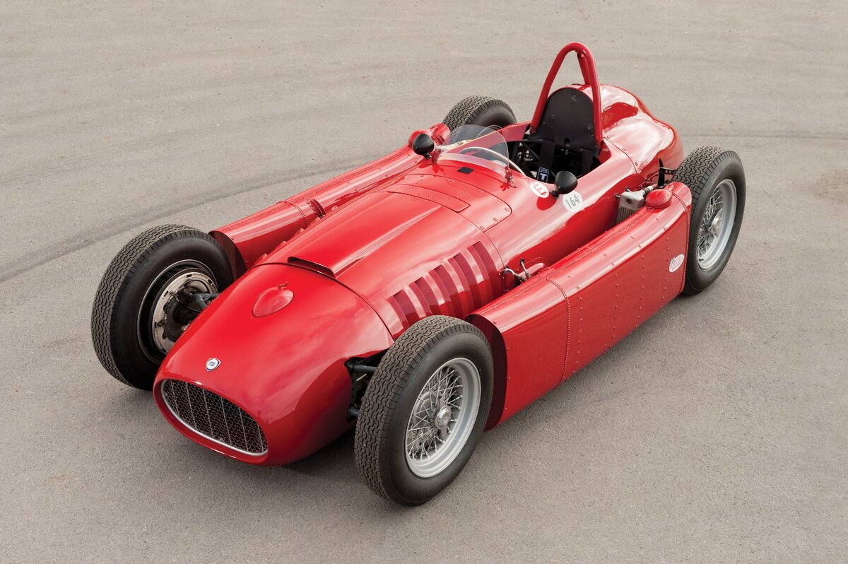 Лянча против феррари. Lancia Ferrari d50. Ferrari Lancia d50 1956. Lancia Ferrari d50 Фанхио. Ferrari f1 1955.