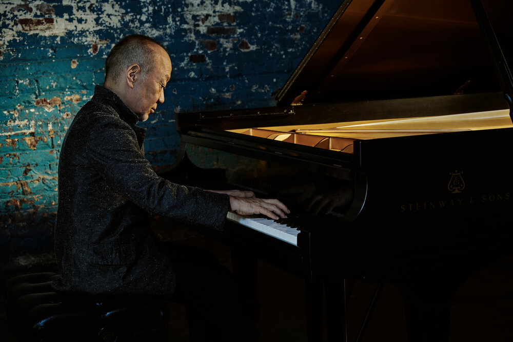  Композитор  Joe Hisaishi.