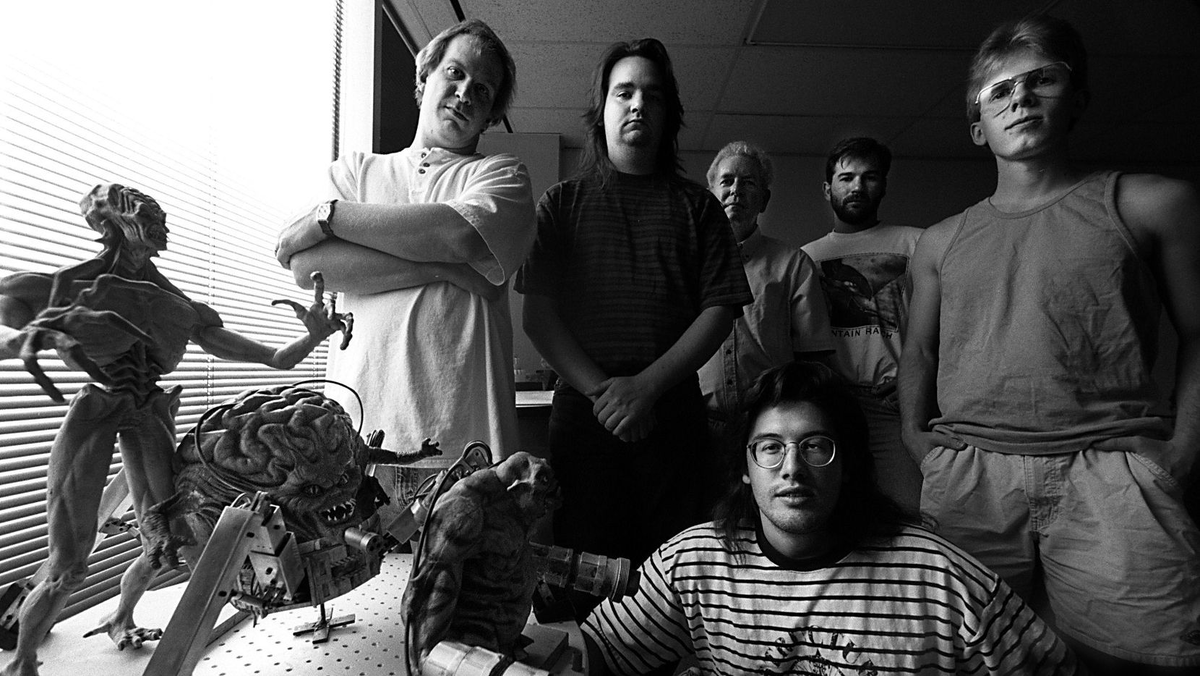  Джон Ромеро, Том Холл, Адриан Кармак и Джон Кармак и бизнес-менеджер Джей Уилбер