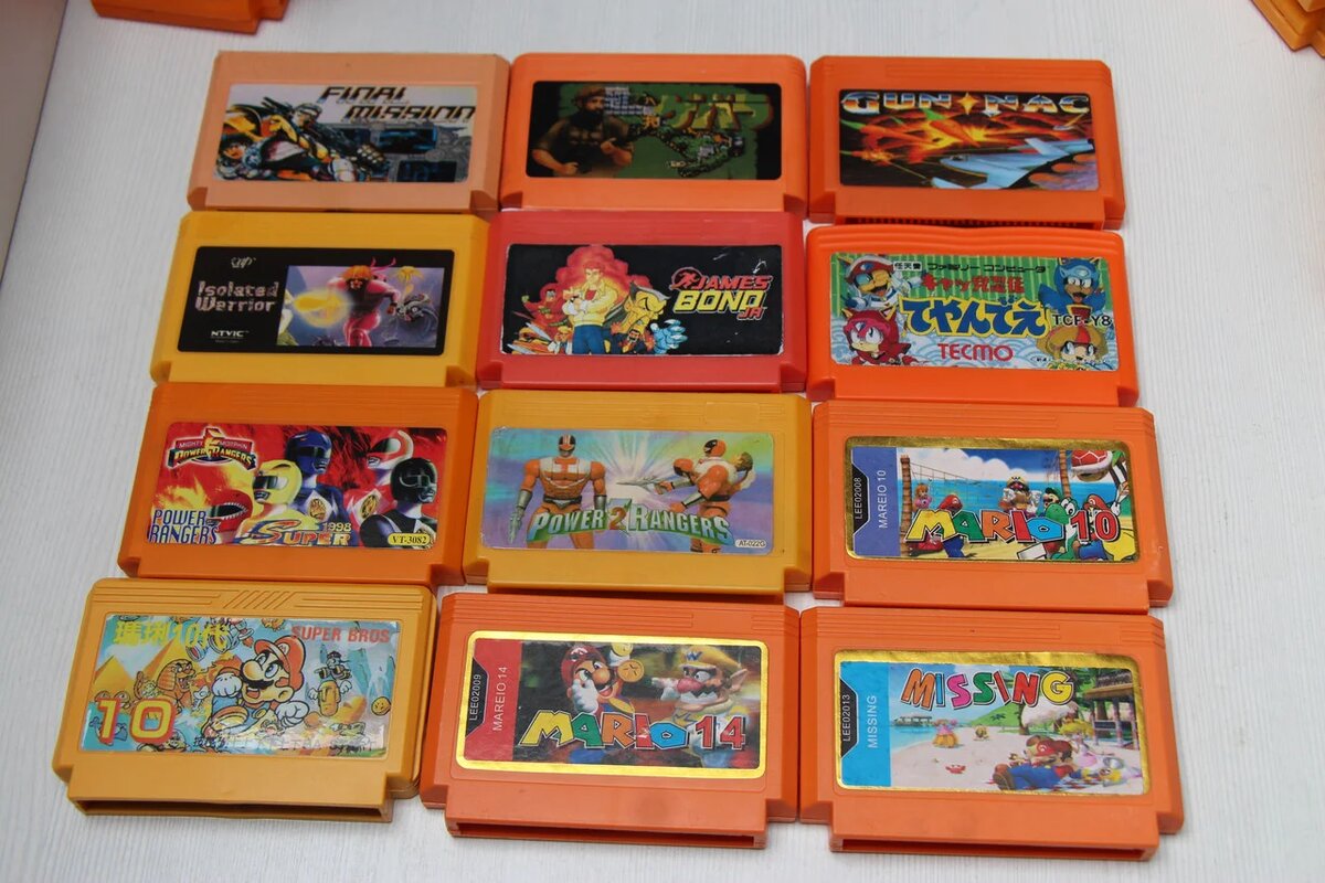 Типичные картриджи Денди, фотография взята с сайта https://delta-astana.kz/p21497430-kartridzhi-dlya-dendy.html