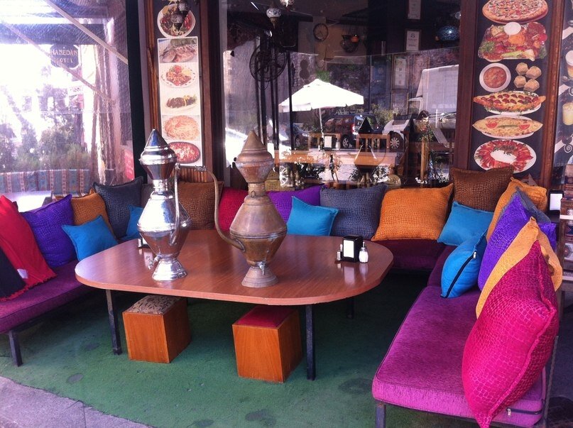 Вот такие там яркие и удобные диванчики.  