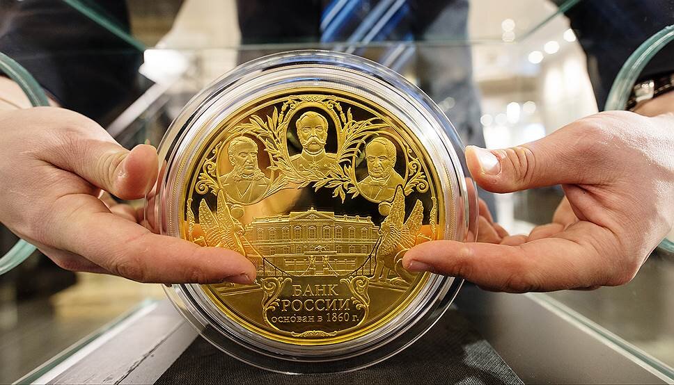 российский рубль и золото. золотые слитки российской империи. коллекционные и инвестиционные монеты. золотой победоносец. золотой рубль.