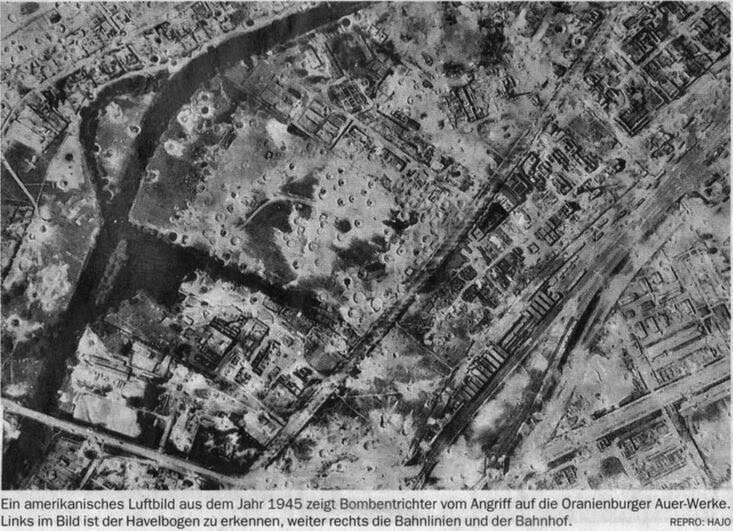 [разбитая первой волной территория завода, напоминающая лунный пейзаж]