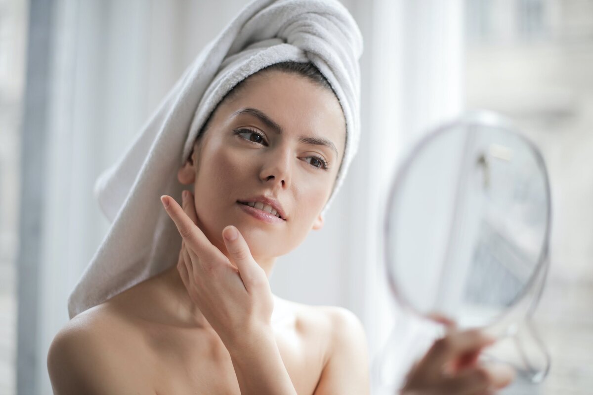 https://www.pexels.com/photo/selective-focus-portrait-photo-of-woman-with-a-towel-on-head-looking-in-the-mirror-3764013/