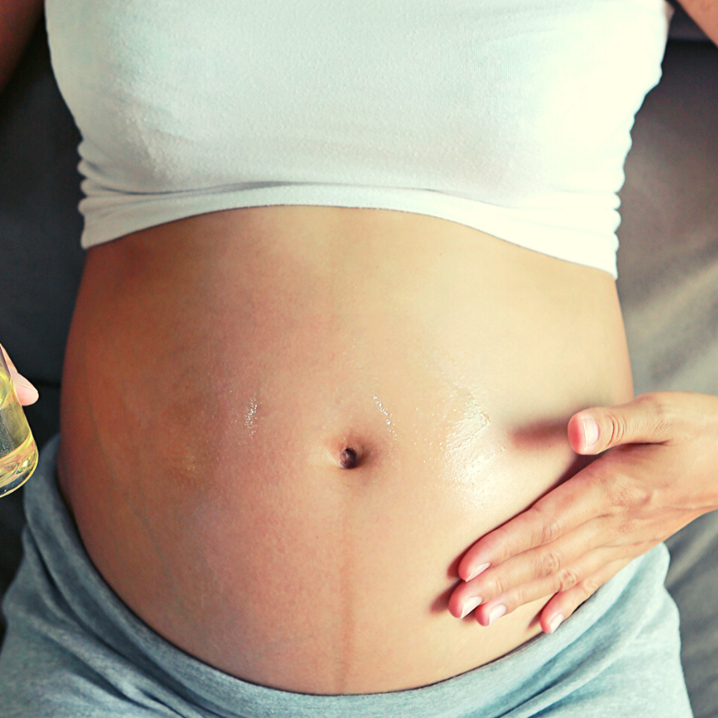 Почему во время беременности появляется тёмная полоса на животе?