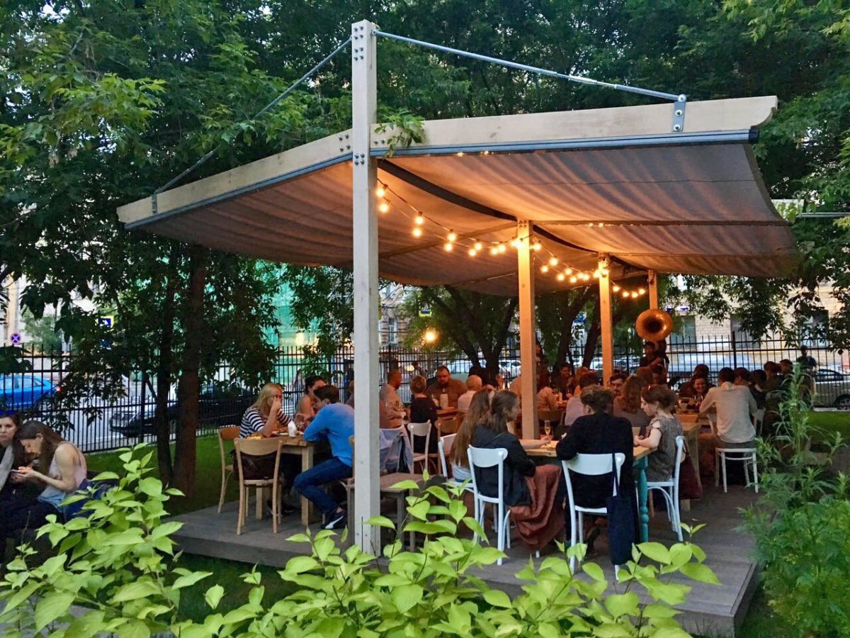 Летняя веранда по проекту baterfly компании "ДДМ-Строй"