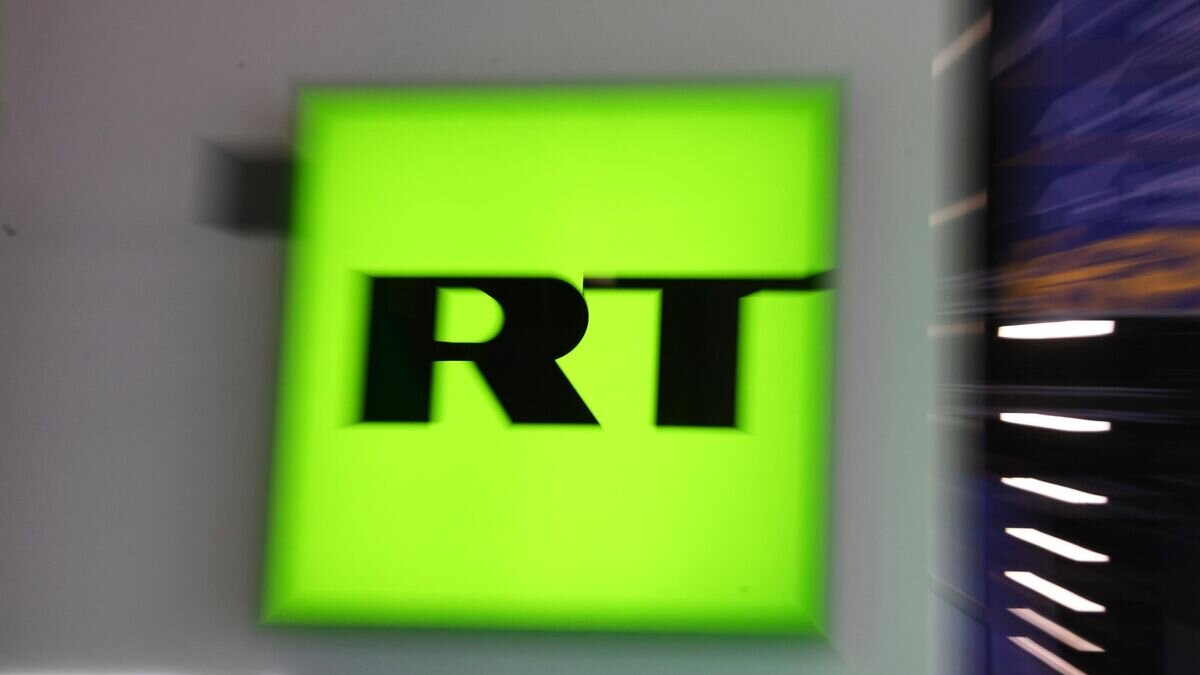    Логотип телеканала RT © РИА Новости / Илья Питалев