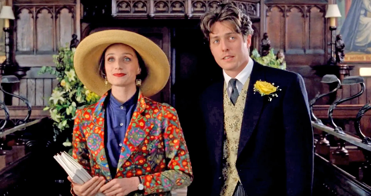 Кристин Скотт Томас и Хью Грант в фильме “Четыре свадьбы и похороны”, 1994 год.