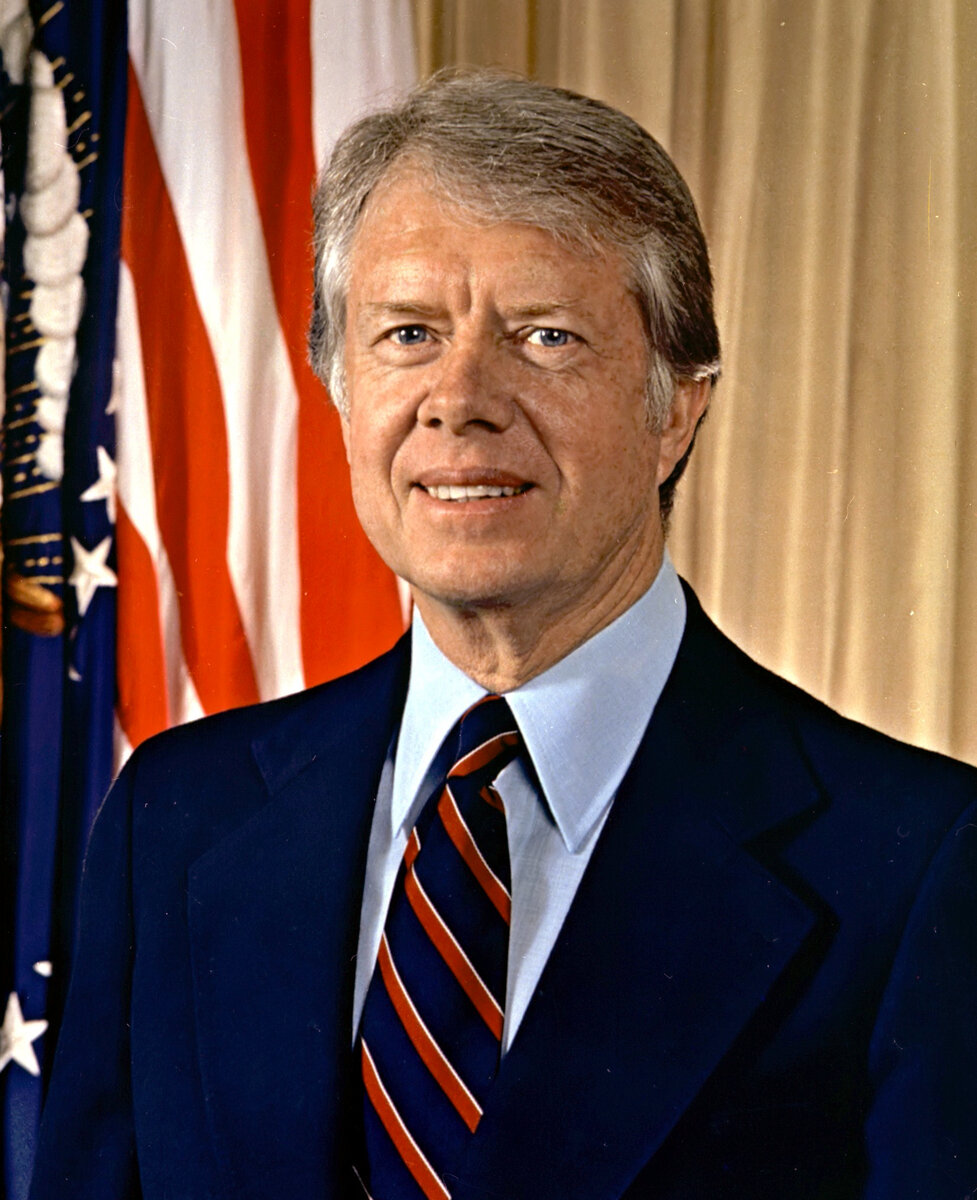 Президент США Джимми Картер.  39-й президент США (1977—1981 гг.) от Демократической партии. Лауреат Нобелевской премии мира 2002 г. Самый долгоживущий в истории Президент США. Во время его правления цены на нефть сильно выросли, что повлияло на значительный рост инфляции и безработицы в стране. Взято из интернет-ресурса. 