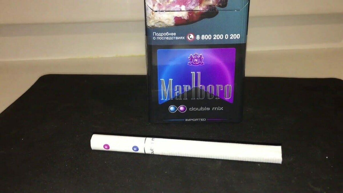 Мальборо с двумя цена. Мальборо сигареты с 2 кнопками фиолетовые. Мальборо сигареты с кнопкой 2 вкусы. Сигареты Marlboro 2 кнопки. Сигареты Мальборо с 2 кнопками.