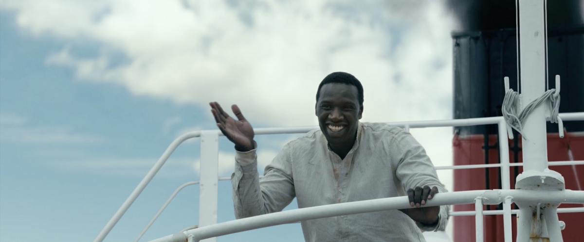 Нок машет напоследок людям, которым задолжал много денег