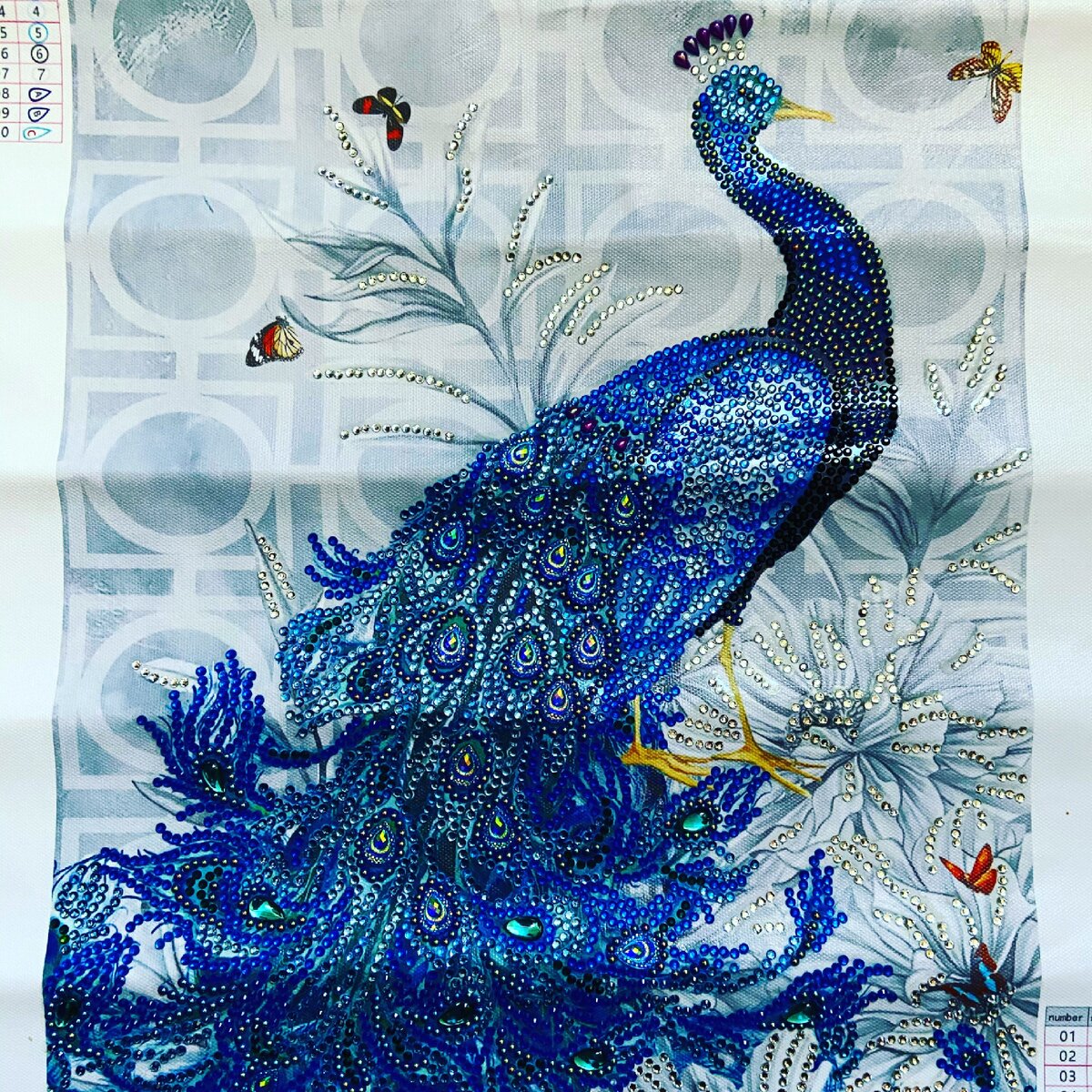 А вот мой павлин с Алика. В рамке под музейное стекло будет совершенно другой вид.