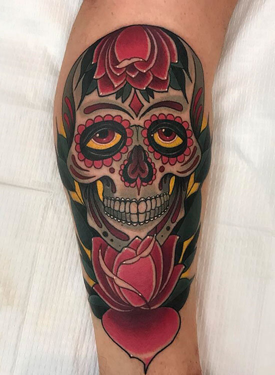 Значение татуировки череп с розой в зубах