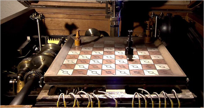 collision detection: El Ajedrecista -- an analog chess-playing computer  from 1912
