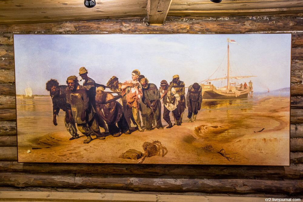 Картина где люди тащат корабль