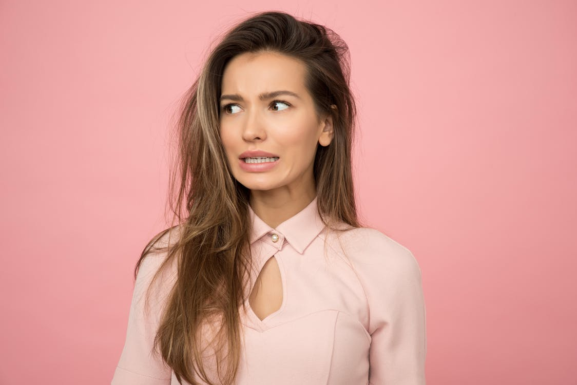 https://www.pexels.com/photo/woman-wearing-pink-top-1036620/
