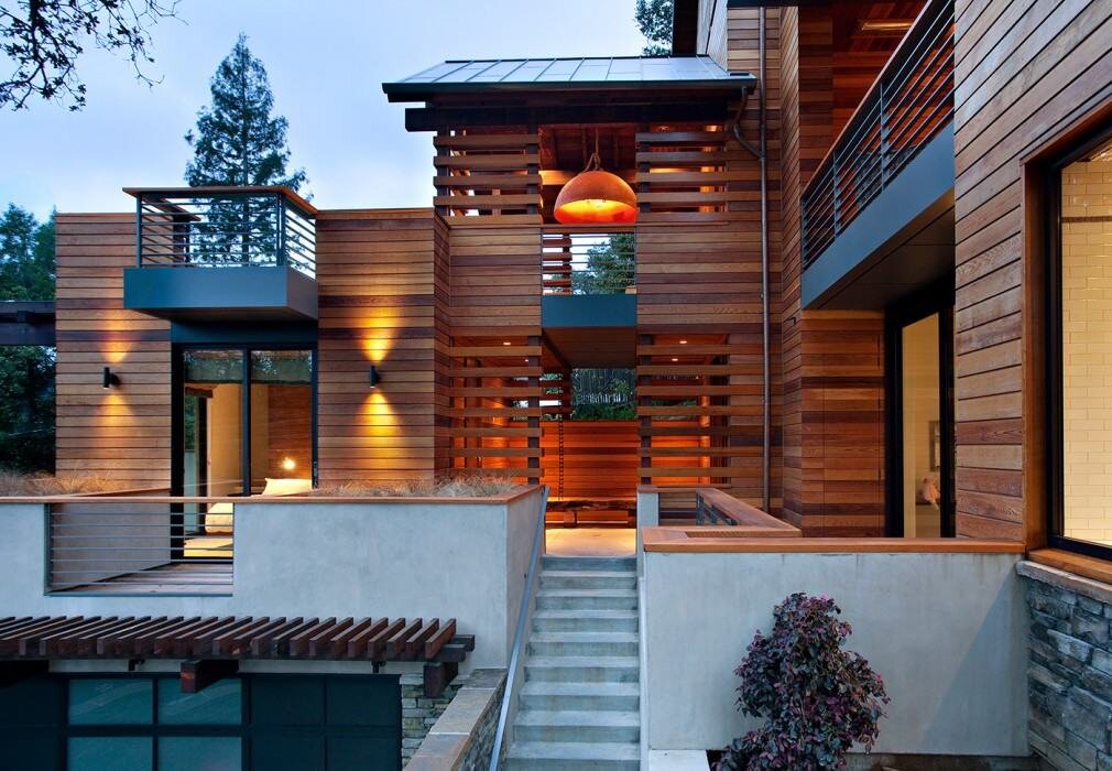 Использование доски в облицовке фасадов