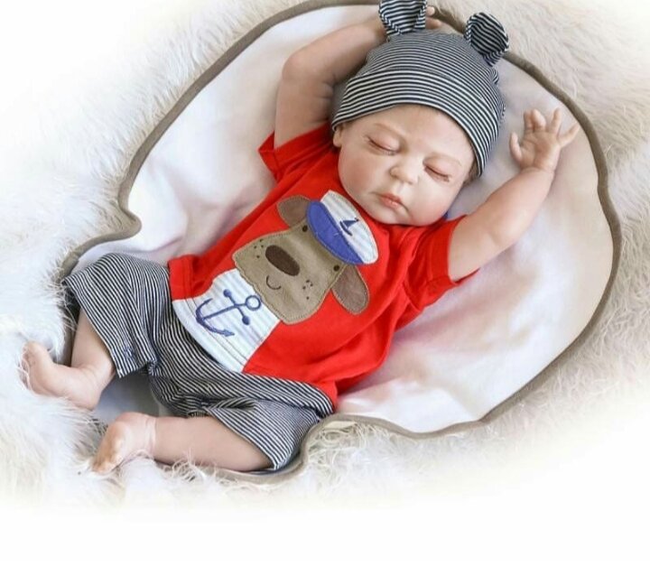 Это не ребенок это кукла