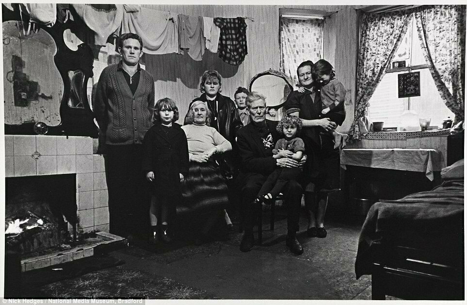 Liverpool, 1969. Three generations of a family live in one rented basement room.