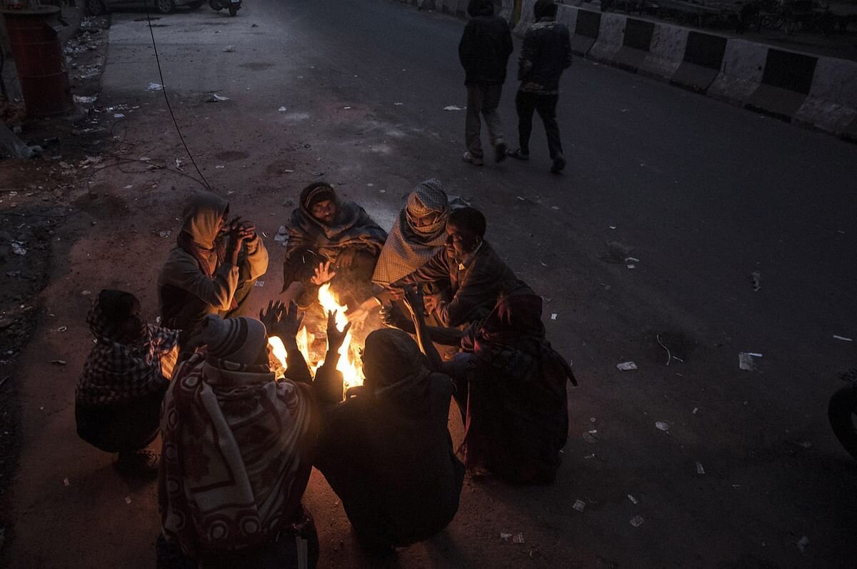 Indians sitting around Fire