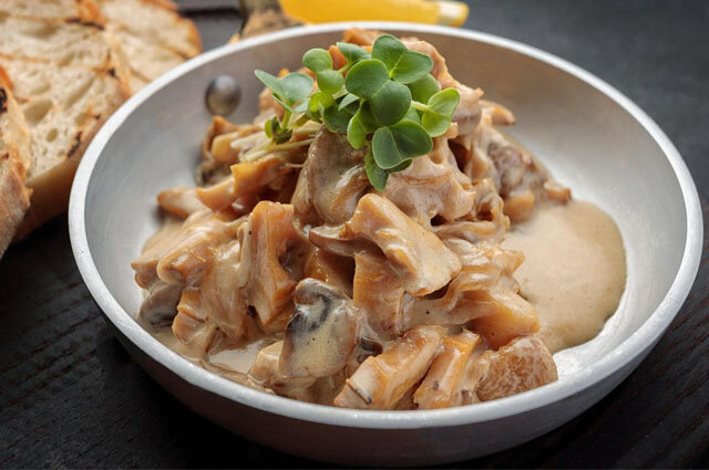    Тушёные в сметане рапаны. Фото: ru.freepik.com